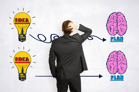 Young businessman with creative business sketch. Idea, brainstorming and finance conceptの写真素材