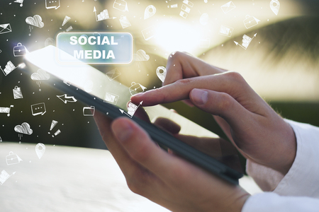 Hands using smartphone with social media sketch. Communication and web conceptの写真素材