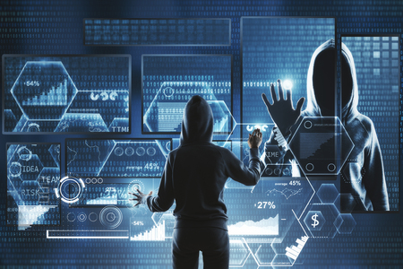 Hacking and information concept. Hacker using abstract laptop with binary code digital interface. Double exposureの写真素材
