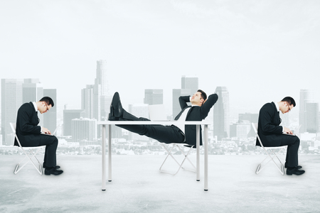 Relaxing and working businesspeople on creative city wallpaper. Lifestyle, business and occupation conceptの写真素材