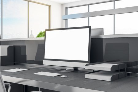Empty computer in contemporary office interior with daylight. Creative designer desktop. Mock up, 3D Renderingの写真素材
