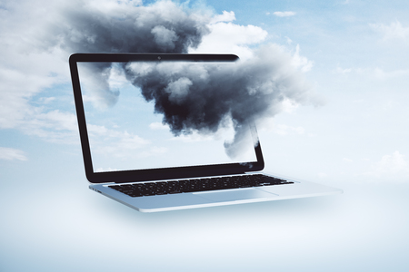 Abstract laptop with cloud on screen. Sky background. Cloud computing and technology conceptの写真素材