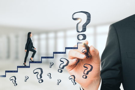 Businesswoman climbing abstract stairs sketch with question marks on blurry background. Career promotion and ascend conceptの写真素材