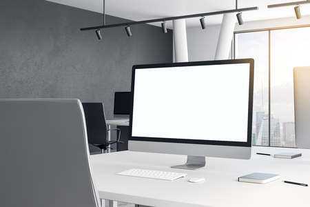 Close up of creative designer table with empty computer in modern office. Mock up, 3D Renderingの写真素材