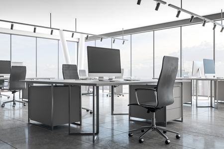 Modern coworking office interior with New York city view, empty computer and daylight. 3D Renderingの写真素材