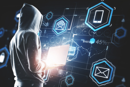 Hacker using laptop with digital business interface. Hacking, future and information concept. Double exposureの写真素材