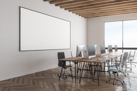 Side view of modern office workplace interior with empty banner and New York city view. Mock up, 3D Renderingの写真素材