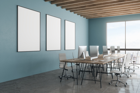 Side view of modern office workplace interior with clean poster and New York city view. Mock up, 3D Renderingの写真素材
