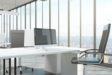 Empty computer screen in coworking office interior. Mock up, 3D Rendering の写真素材