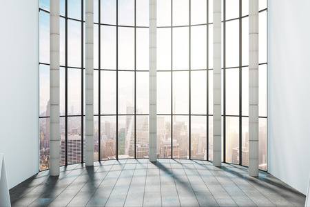 Empty office interior with panoramic New York city view and sunlight. 3D Renderingの写真素材