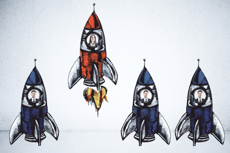 Creative colorful rocket sketch with businesspeople on concrete wall background. Startup and teamwork conceptの写真素材