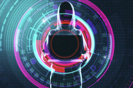 Young hacker using laptop with digital button on blue background. Virus and innovation concept. Double exposureの写真素材