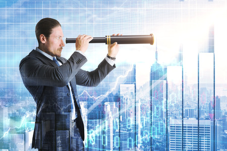 Side view of attractive young businessman using telescope on abstract New York city background with forex chart. Research and investment concept. Double exposureの写真素材