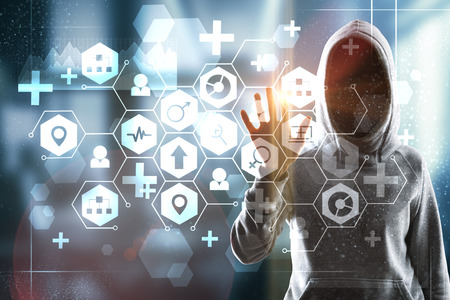 Hacker using creative medical interface on blurry background. Medicine and hacking concept.の写真素材