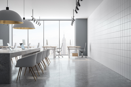 Coworking office interior with panoramic New York city view and daylight. 3D Renderingの写真素材