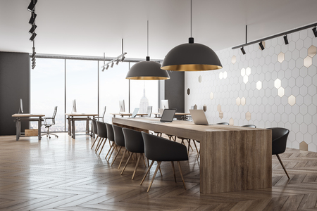 Clean coworking office interior with panoramic New York city view and daylight. 3D Renderingの写真素材