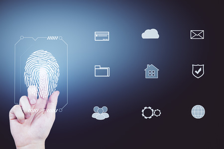 Fingerprint scan provides security access with biometrics identification, person touching screen on gray background. Unlock and verification conceptの写真素材