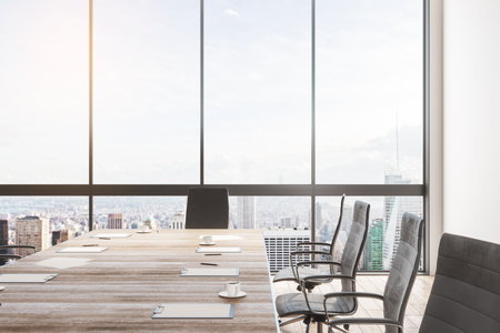 Clean meeting room interior with copy space, wooden furniture and panoramic city with sky view. 3D Renderingの写真素材