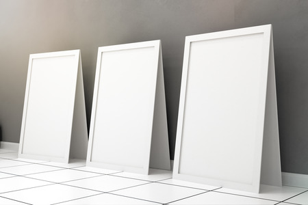 Side view of empty banners in room with concrete wall and tile floor. Mock up, 3D Renderingの写真素材