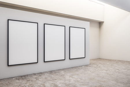 Modern concrete exhibition hall interior with posters and gray floor. Gallery concept. Mock up, 3D Renderingの写真素材