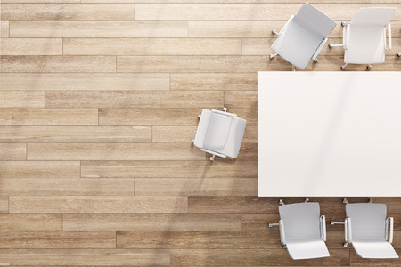 Top view of modern meeting room with table, chairs and copy space on wooden floor. Mock up, 3D Rendering の写真素材