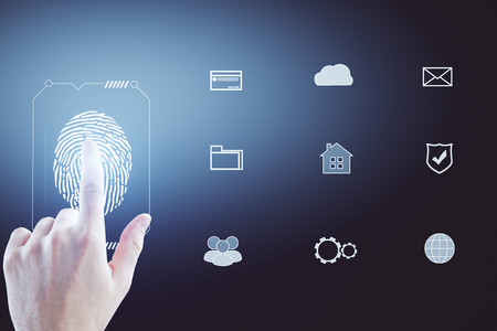 Fingerprint scan provides security access with biometrics identification, person touching screen on gray background. Password and verification concept の写真素材