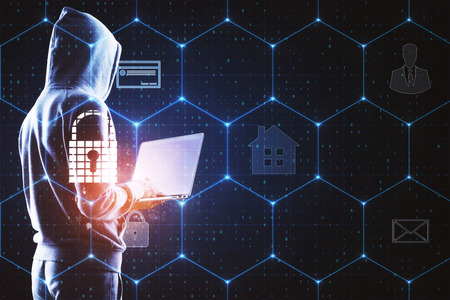 Side view of hacker using laptop with abstract digital business interface on blurry background. Innovation and protection concept. Double exposureの写真素材