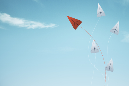 Creative paper planes on blue sky background. Leadership and way concept. 3D Renderingの写真素材