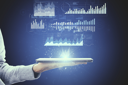 Hand holding smartphone with digital financial business interface. Analytics and innovation conceptの写真素材