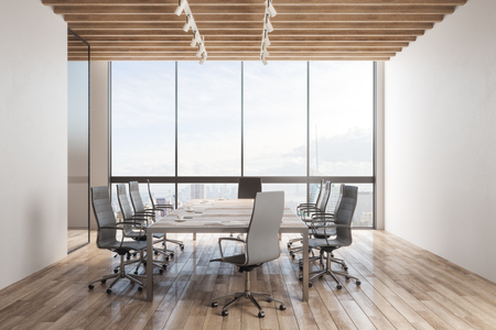 Modern meeting room interior with copy space on concrete wall, furniture, wooden floor and panoramic city with sky view. 3D Renderingの写真素材