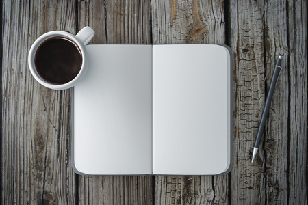 Top view of wooden desk with empty supplies and coffee cup. Mock up, 3D Renderingの写真素材