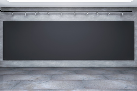 Modern concrete exhibition hall interior with empty black poster. Gallery and museum concept. Mock up, 3D Renderingの写真素材