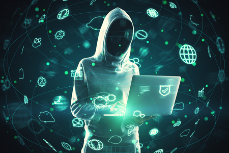 Hacker using laptop with blurry digital interface on dark background. Social network and criminal concept. Double exposureの写真素材