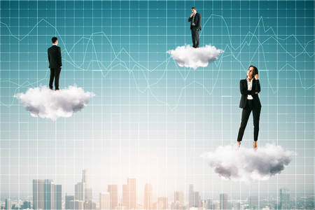 Businesspeople standing on abstract clouds with forex chart grid on blue sky and city background. Trade and finance concept. Double exposureの写真素材