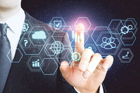 Close up of businessman hand using digital business interface. Finance and innovation concept. Double exposureの写真素材