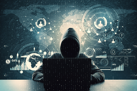 Hacker using laptop with abstract business interface at desktop with binary code. Technology and...