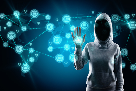 Social network and malware concept. Hacker with glowing connections on blue digital map