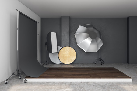 Simple concrete photo studio interior with professional equipment. Photography and design concept. 3D Renderingの写真素材