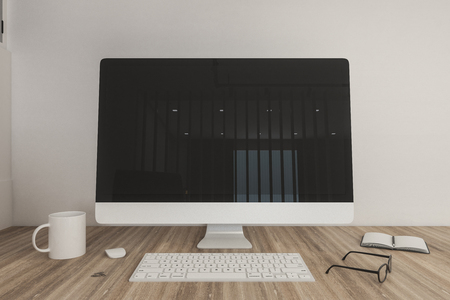 Creative wooden designer desktop with empty black computer, coffee cup, keyboard and supplies. Mock up, 3D Renderingの写真素材