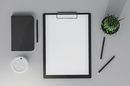 Top view of white desktop with empty supplies, coffee cup and decorative plant. Mock up, 3D Renderingの写真素材