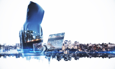Side view of hacker using laptop on white glowing night city background. Technology and theft...