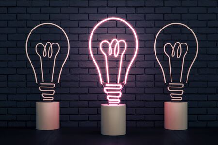 Abstract neon light bulbs on brick wall background. Idea and innovation concept. 3D Rendering の写真素材