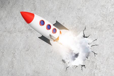 Launching rocket on concrete background. Startup and break through concept. 3D Renderingの写真素材