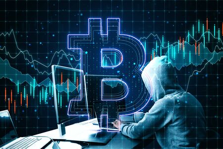 Hacking concept with no face person using laptop and bitcoin sign at glowing business chart...