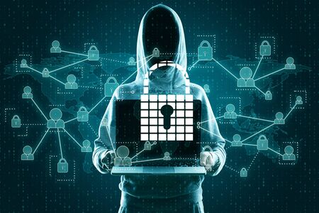 Hacker using laptop with abstract padlock network hologram on blue binary code background. Safety...