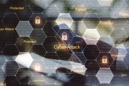 Computer privacy attack with man hand with smartphone and digital screen with lock icons.Double exposure.の写真素材