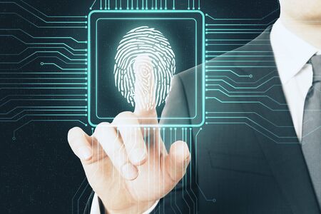 Digital protection concept with digital screen with microchip and fingerprint pushing by...