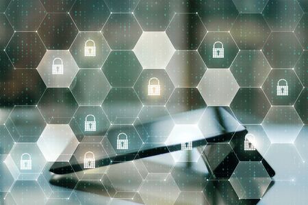 Close up of tablet with padlock interface. Technology and password concept. Double exposureの写真素材