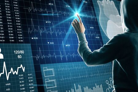 Medicine and technology concept. Hand using creative glowing blue medical cardiology interface on...
