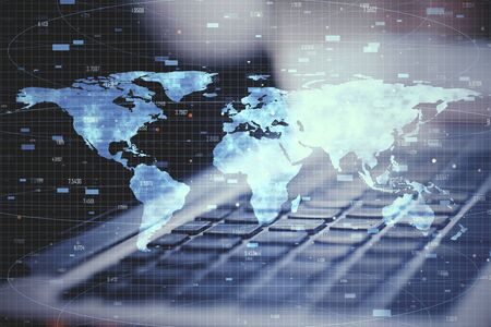 Close up of laptop with digital map. Global business and interactive concept. Double exposure